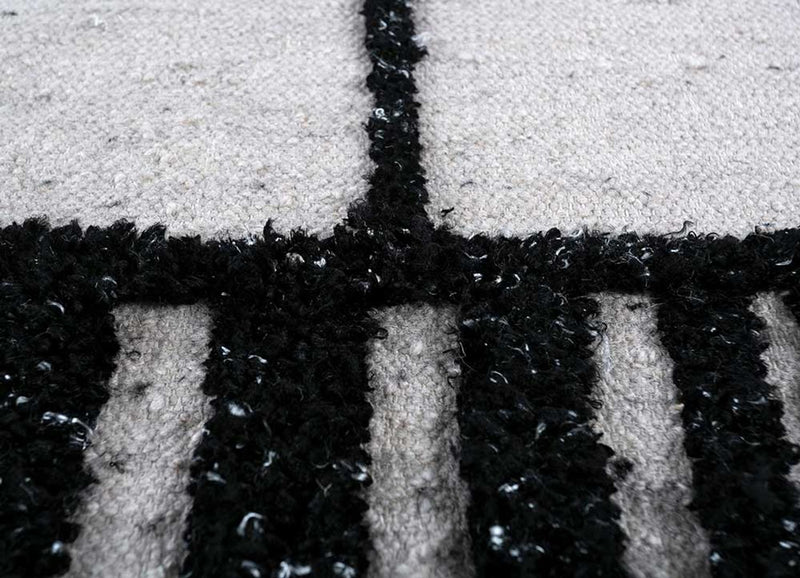 Wollteppich - 240 x 150 cm - schwarz-weiß