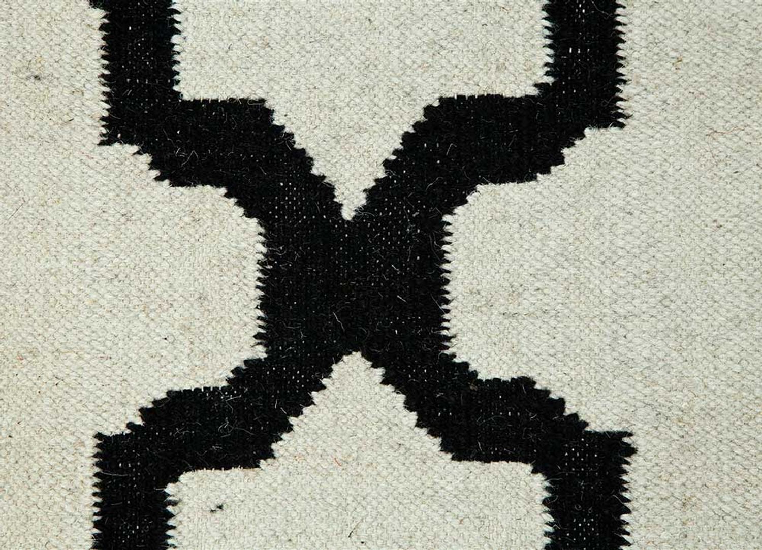 Wollteppich - 240 x 150 cm - schwarz-weiß