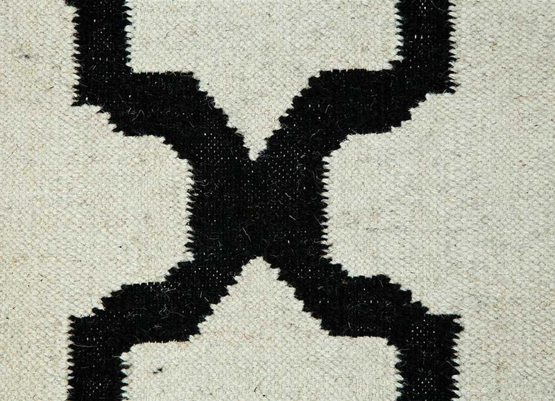 Wollteppich - 240 x 150 cm - schwarz-weiß