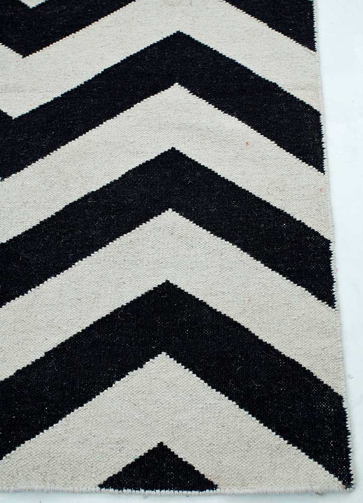 Wollteppich - 240 x 150 cm - schwarz-weiß