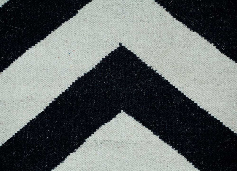 Wollteppich - 240 x 150 cm - schwarz-weiß