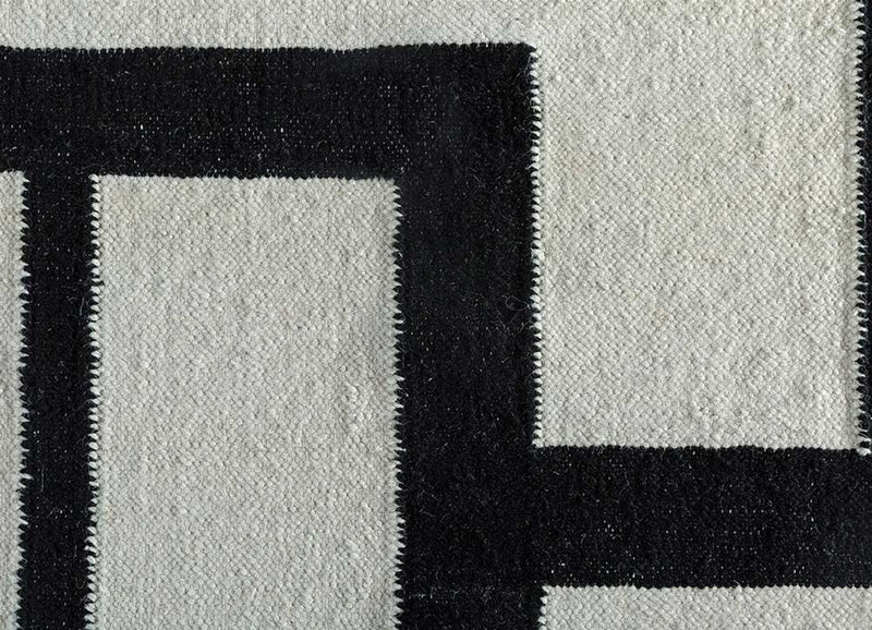 Wollteppich - 240 x 150 cm - schwarz-weiß