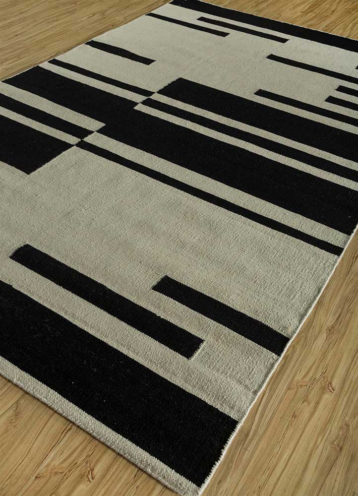 Wollteppich - 240 x 150 cm - schwarz-weiß
